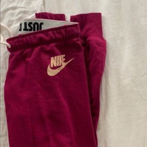 Maroon Nike sweats